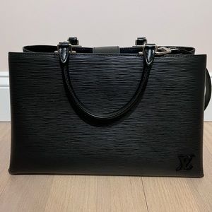 Louis Vuitton
Kleber leather handbag